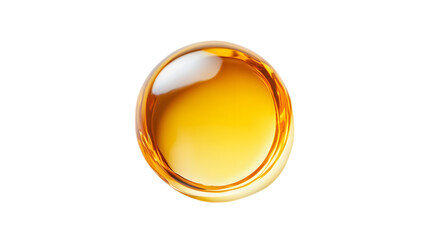 Circular droplet of yellow oily liquid on white background