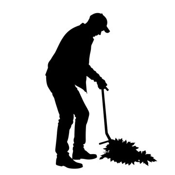 recommend clip art: Man raking leaves in autumn silhouette against a white background  