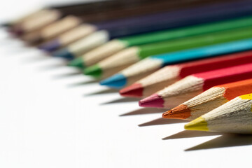 Obraz premium A set of colorful pencils ready to use. Macro photography. School, office or graphic design materials.