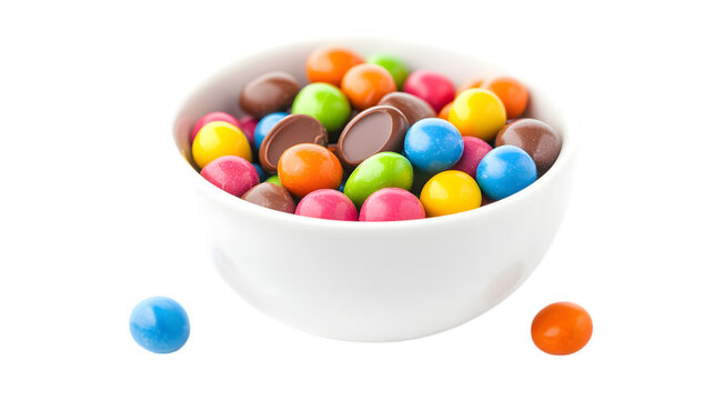 White bowl with colorful candy-coated chocolates isolated on white background