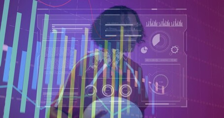 Holding rugby ball, person analyzing data with animation graphics in school - Powered by Adobe