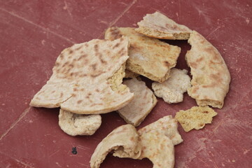 Pieces of dry bread on the floor