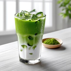 Refreshing Matcha Latte in Clear Glass with Ice and Milk, Perfect for Bright and Airy Ambiance