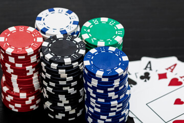Casino chips and cards on the table. Gambling concept