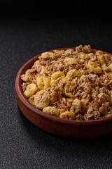Flakes, chocolate balls and dried fruit for a hearty breakfast