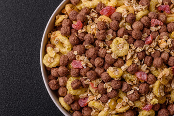 Flakes, chocolate balls and dried fruit for a hearty breakfast