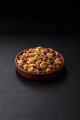 Flakes, chocolate balls and dried fruit for a hearty breakfast