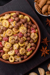 Flakes, chocolate balls and dried fruit for a hearty breakfast