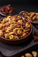 Flakes, chocolate balls and dried fruit for a hearty breakfast