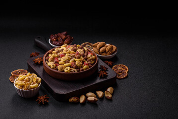Flakes, chocolate balls and dried fruit for a hearty breakfast