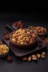 Flakes, chocolate balls and dried fruit for a hearty breakfast