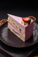 A slice of pink colored puff cake for a birthday celebration