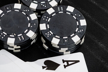 Naklejka premium Casino chips and cards on the table. Gambling concept