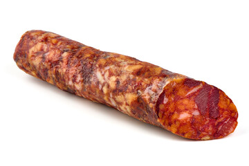 Chorizo sausage, thin cut. Spanish salami, close-up, isolated on white background.