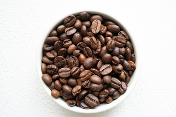 moistened local cultural coffee beans on a rotating background in close-up