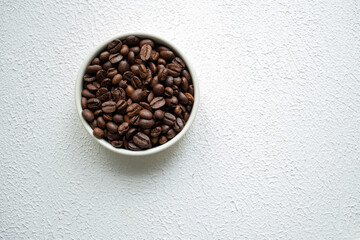 moistened local cultural coffee beans on a rotating background in close-up