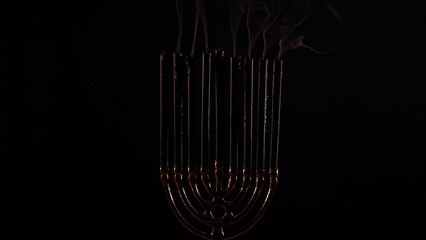 Celebrate the Warmth of Hanukkah With a Festive Menorah Illuminating the Night