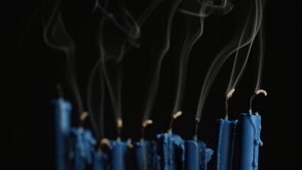 Ceremonial Candlelight Flickers During Hanukkah Celebration Honoring Jewish Traditions and Heritage