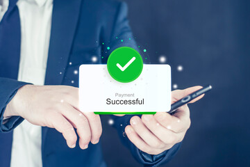Businessman in blue suit holding smartphone with successful payment. Online payment concept.