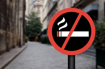 No Smoking sign on city street. Space for text