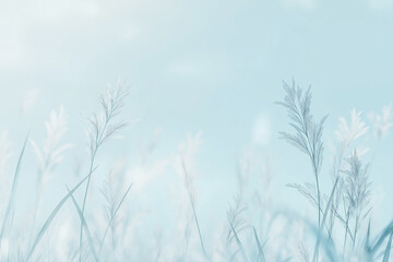  Blurred spring background with green grass, blue sky, and bokeh effect