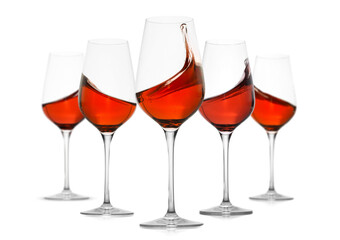 Red wine splashing in glasses on white background, set