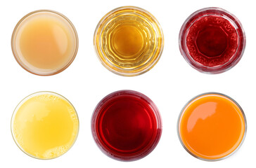 Set of different juices in glasses isolated on white, top view