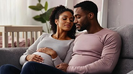 Tender moment of expecting parents on sofa with nursery in background - Powered by Adobe