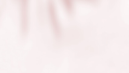 Pink brown shadow of leaves tree plant overlay on wall. Sunlight effect shadow on the wall. Minimal blurred backdrop backgrounds. Summer tropical surface background.