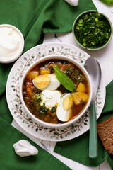 Traditional Ukrainian green borscht with sorrel.style rustic