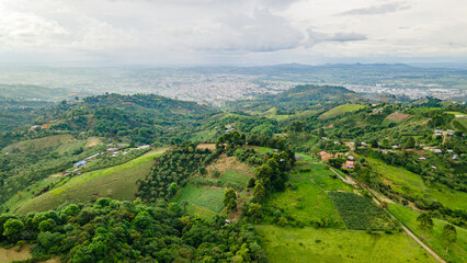 Aerial View of Lush Green Hills and Popayan Cityscape in Cauca, Colombia