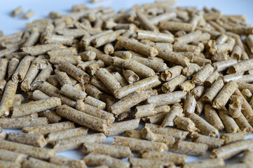 compressed wood shavings eco-friendly pet litter natural care cleanliness chemical-free fragrance-free absorption odor control safe biodegradable after use eco-litter travel-friendly backdground 