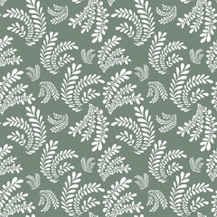 Elegant hand drawn seamless pattern of leafy branches on a muted green background