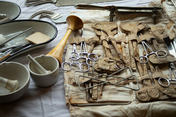 Surgical instruments of the second world war. A medic's kit on the battlefield. Steel surgical instruments.