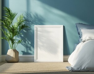 Empty white frame in a teal bedroom