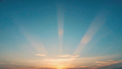 Fototapeta premium A person riding a surfboard in the ocean during sunset