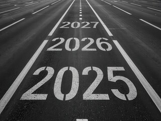 Road markings with future years in bold letters.
