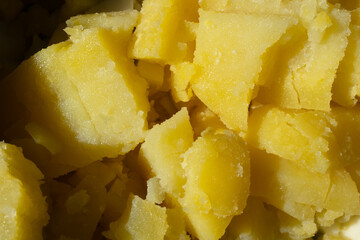 Chopped boiled potatoes. Clouse-up photography.