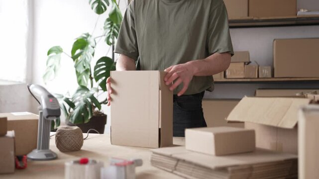 SME owner work preparing dropshipping box at home office. Online retail store, Small business