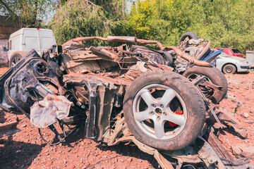 Damaged civilian car after missile strike. War in Ukraine