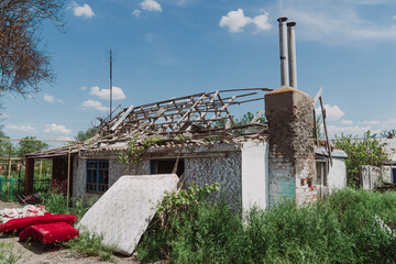 Countryside. A house destroyed by shelling. War in Ukraine