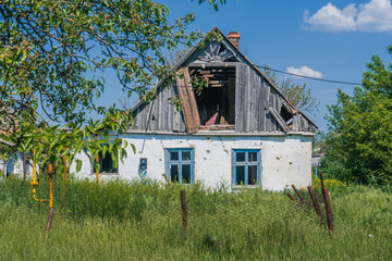 Countryside. A house destroyed by shelling. War in Ukraine