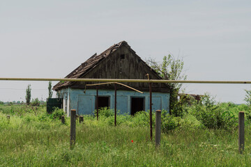 Countryside. A house destroyed by shelling. War in Ukraine