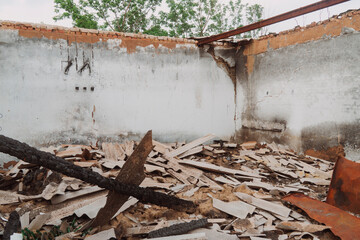 View from inside the house destroyed by shelling. War in Ukraine