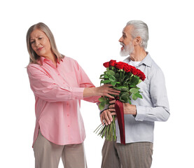 Dissatisfied woman refusing from man's bouquet of red roses on white background