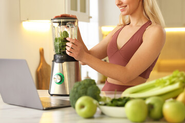 Weight loss. Woman making protein shake at table in kitchen, closeup