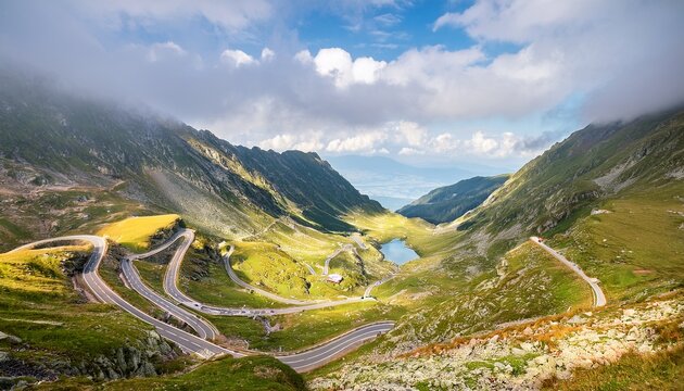 hiking in fagaras mountains on iezerul caprei peak over transfagarasan serpentine road carpathian mountains mountains landscape lake capra