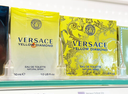 Versace yellow diamond fragrance display in retail setting