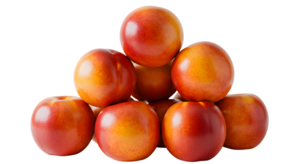 A pyramid stack of fresh nectarines on a black background studio shot