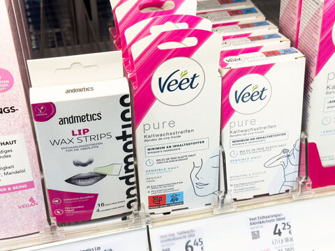 Wax strips for lip and body hair removal in a store display